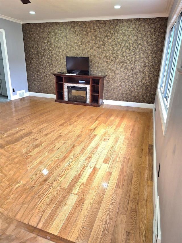 1535 Mattison St, Baldwin, NY 11510 - unfurnished living room with hardwood / wood-style flooring, ornamental molding, wallpapered walls, baseboards, and recessed lighting