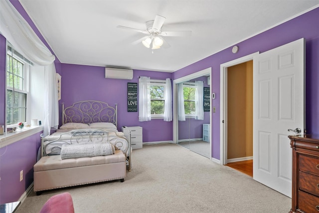 20 Idlewild Park Dr, Cornwall On Hudson, NY 12520 - carpeted bedroom featuring a wall mounted air conditioner, baseboards, and a ceiling fan