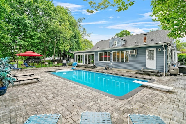 20 Idlewild Park Dr, Cornwall On Hudson, NY 12520 - view of pool with a patio area, entry steps, and a diving board