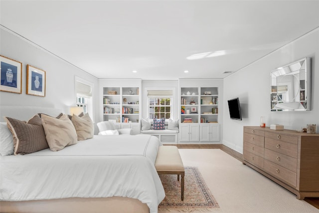 bedroom with multiple windows, recessed lighting, and baseboards