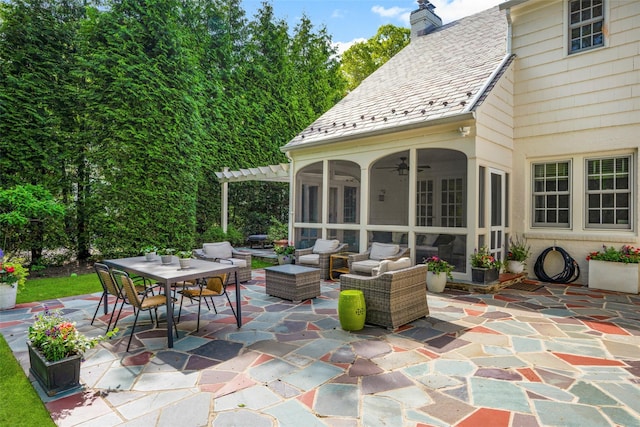 view of patio featuring a ceiling fan, outdoor dining space, and an outdoor hangout area