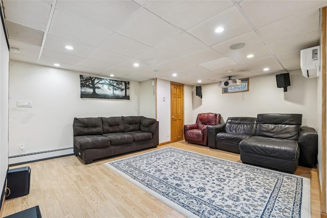 502S11th St., New Hyde Park, NY 11040 - living room with a baseboard heating unit, wood finished floors, and recessed lighting