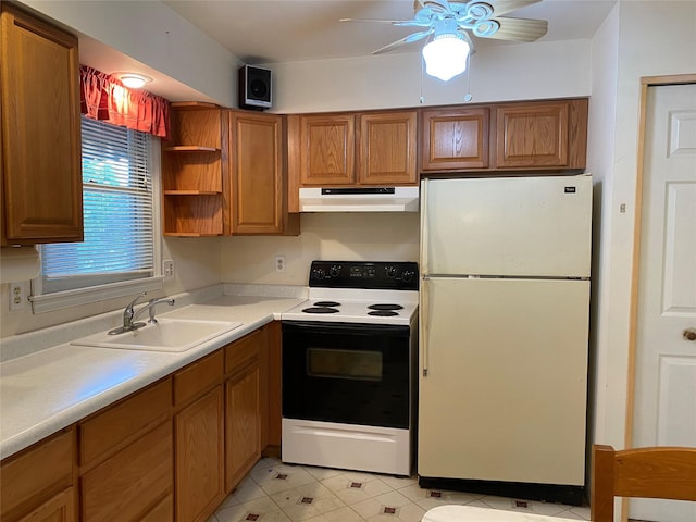 18 Prides Xing, Washingtonville, NY 10992 - kitchen with freestanding refrigerator, range with electric cooktop, under cabinet range hood, a sink, and ceiling fan