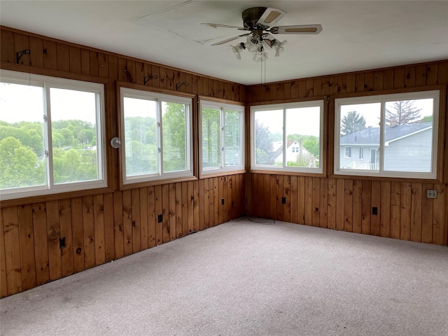18 Prides Xing, Washingtonville, NY 10992 - unfurnished sunroom featuring carpet flooring, healthy amount of natural light, and wood walls
