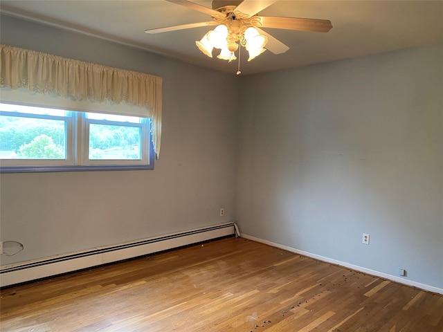 18 Prides Xing, Washingtonville, NY 10992 - empty room with a baseboard radiator, light wood-style floors, baseboards, and a ceiling fan