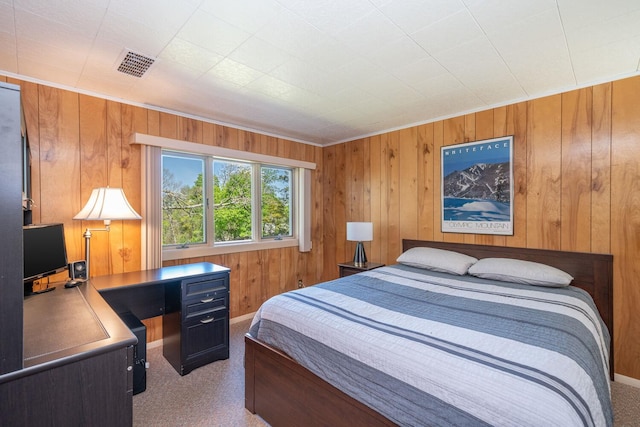 25 Ganung Dr, Ossining, NY 10562 - carpeted bedroom with wood walls and a desk
