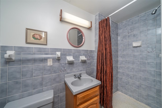 25 Ganung Dr, Ossining, NY 10562 - bathroom with tiled shower, toilet, vanity, and tile walls