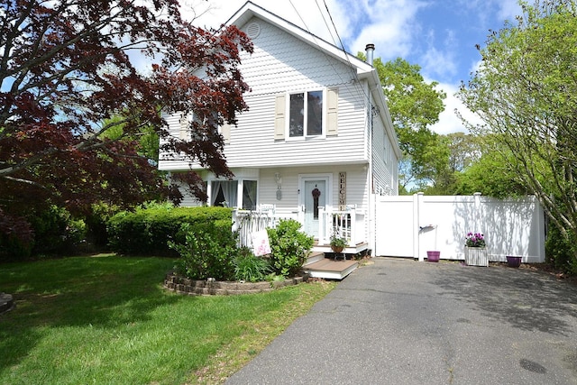 21 Northern Blvd, Shirley, NY 11967 - view of front of property featuring a front lawn, a gate, and asphalt driveway