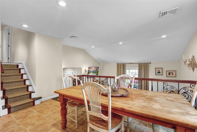 dining space featuring vaulted ceiling, recessed lighting, and baseboards