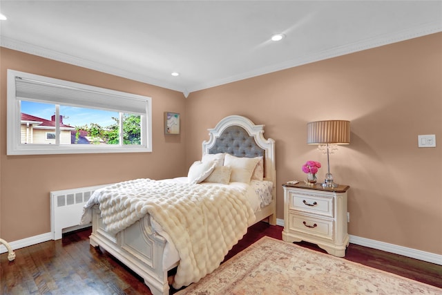 bedroom with radiator heating unit, baseboards, crown molding, recessed lighting, and dark wood-type flooring