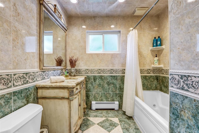 full bathroom with baseboard heating, tile walls, vanity, shower / bath combination with curtain, and toilet