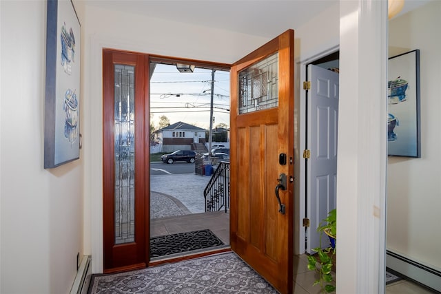 foyer featuring baseboard heating