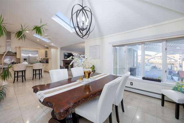dining space with light tile patterned flooring, a chandelier, and high vaulted ceiling