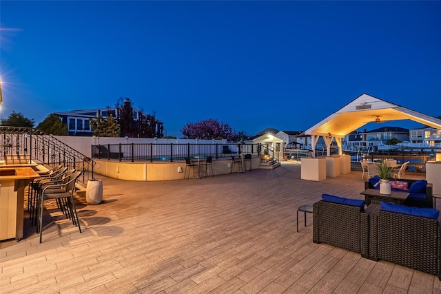 view of deck at twilight