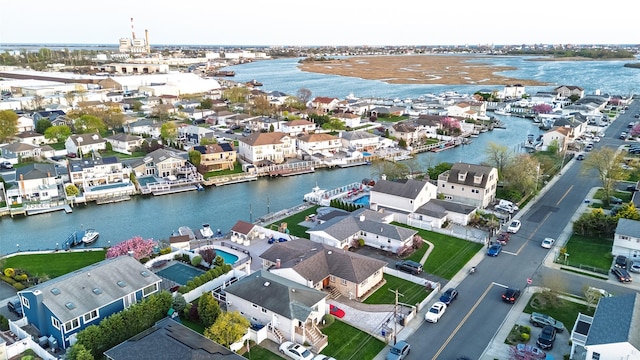 aerial view of residential area with a nearby body of water