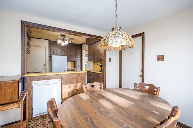 dining area featuring ceiling fan