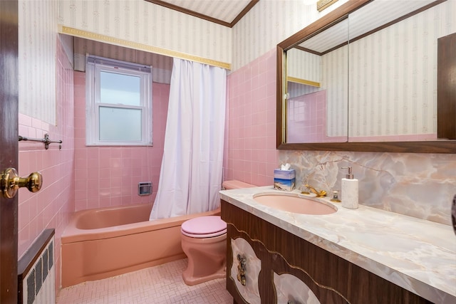 full bathroom featuring wallpapered walls, radiator heating unit, toilet, tile walls, and vanity