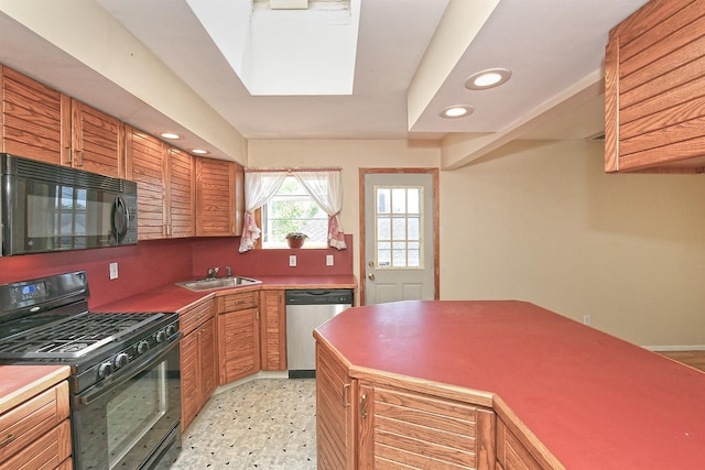 64 S Nassau St, Bethpage, NY 11714 - kitchen featuring black appliances, a sink, recessed lighting, brown cabinetry, and light flooring