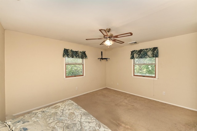 64 S Nassau St, Bethpage, NY 11714 - unfurnished room featuring healthy amount of natural light, carpet, ceiling fan, and baseboards