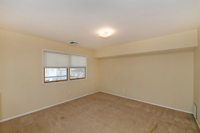 64 S Nassau St, Bethpage, NY 11714 - unfurnished room with light carpet and baseboards