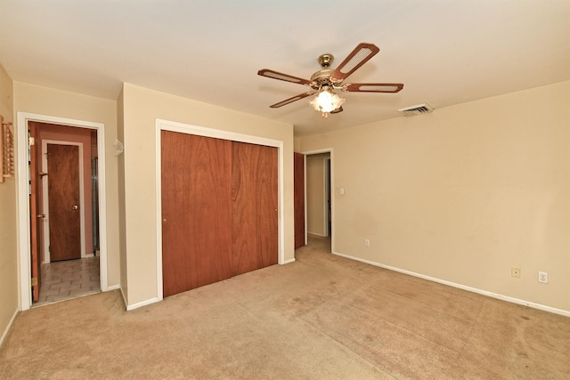 64 S Nassau St, Bethpage, NY 11714 - unfurnished bedroom featuring light colored carpet, baseboards, a closet, and ceiling fan