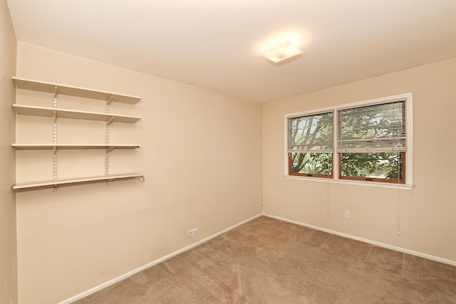 64 S Nassau St, Bethpage, NY 11714 - spare room featuring light carpet and baseboards