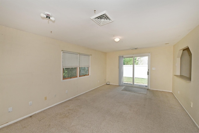 64 S Nassau St, Bethpage, NY 11714 - carpeted empty room with baseboards