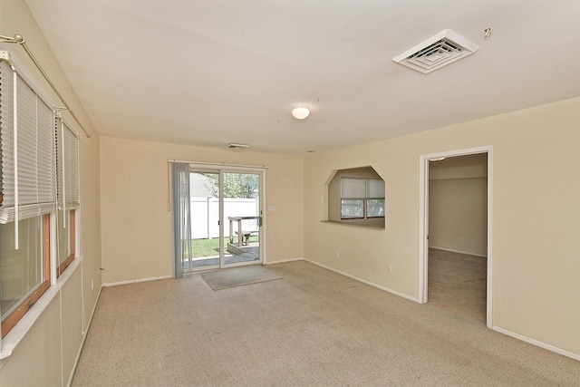 64 S Nassau St, Bethpage, NY 11714 - empty room with light colored carpet and baseboards