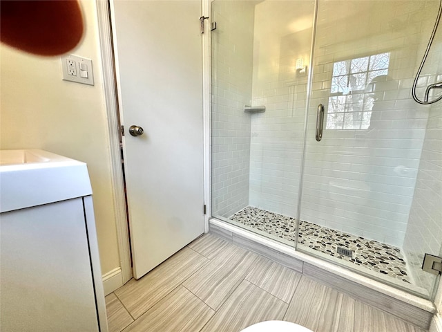 full bathroom featuring a shower stall
