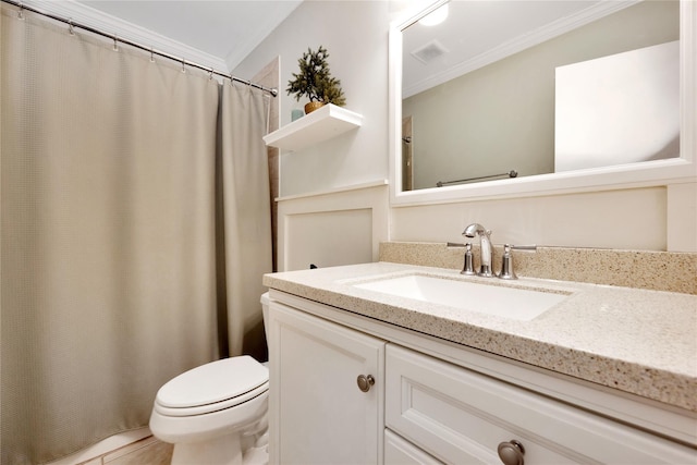 bathroom with crown molding, toilet, vanity, and curtained shower