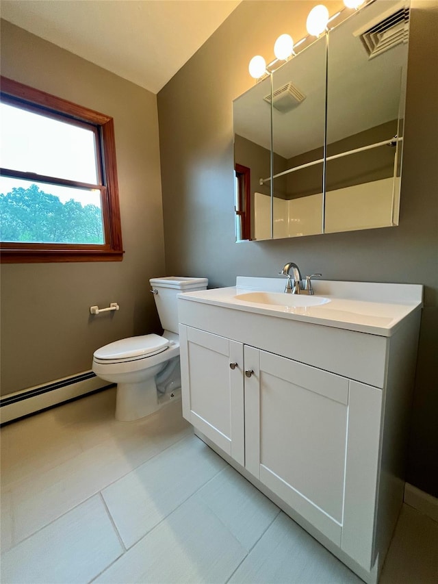 51 Pine Ct, Middletown, NY 10941 - bathroom featuring a baseboard heating unit, toilet, vanity, and tile patterned floors