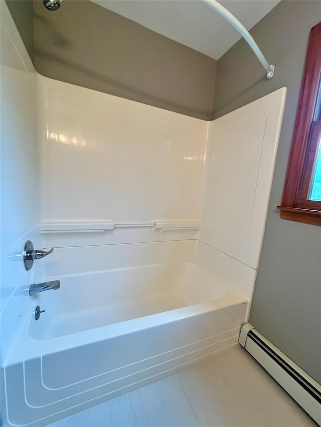 51 Pine Ct, Middletown, NY 10941 - full bathroom featuring a baseboard radiator and washtub / shower combination