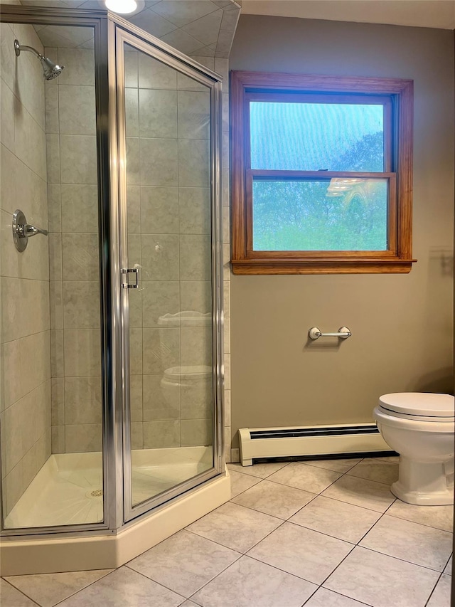 51 Pine Ct, Middletown, NY 10941 - bathroom featuring tile patterned flooring, baseboard heating, plenty of natural light, and a shower stall