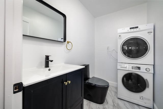 13 Curve Ln, Levittown, NY 11756 - laundry room featuring stacked washer / dryer, light marble finish flooring, a sink, and baseboards