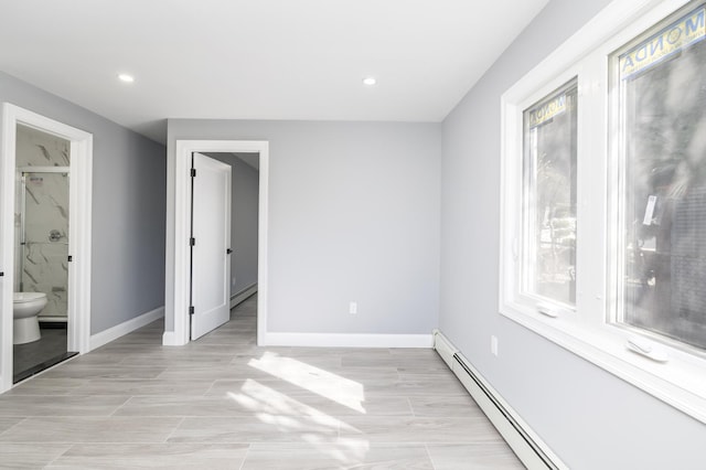 13 Curve Ln, Levittown, NY 11756 - unfurnished bedroom with a baseboard radiator, baseboards, a baseboard heating unit, recessed lighting, and connected bathroom