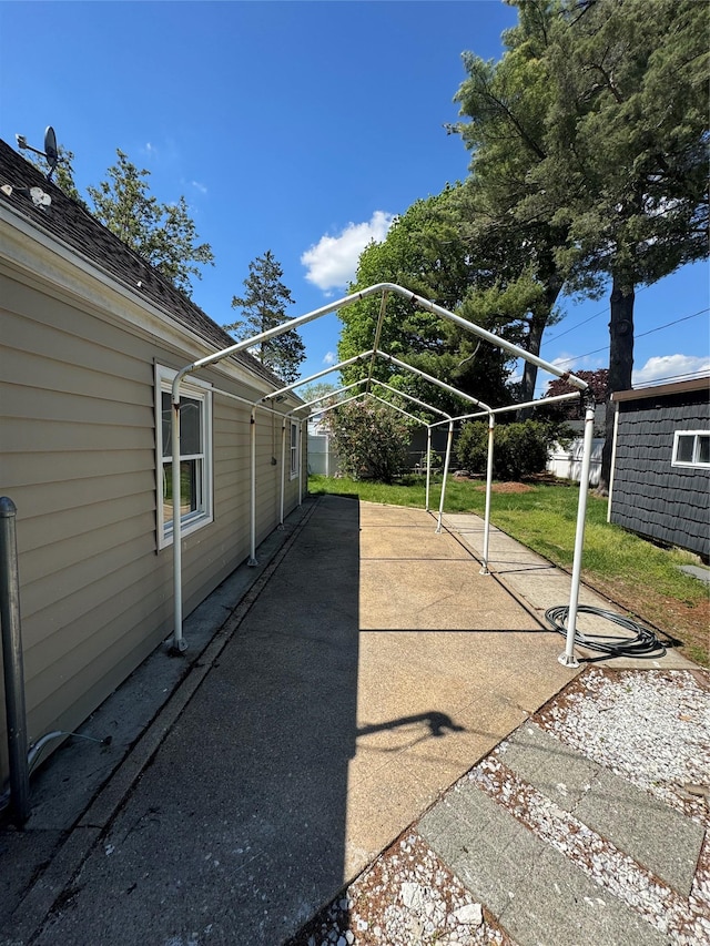 13 Curve Ln, Levittown, NY 11756 - view of patio / terrace featuring fence