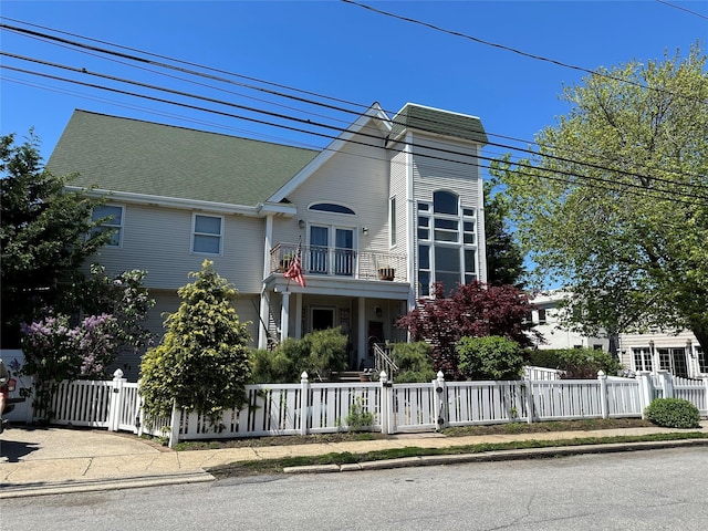 139 Coronado St, Atlantic Beach, NY 11509 - view of front of home with a balcony, a gate, and a fenced front yard