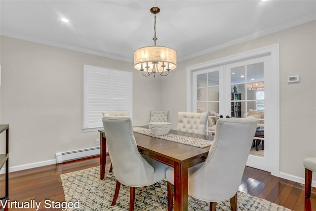 dining area with baseboard heating, french doors, a chandelier, dark wood-style flooring, and crown molding
