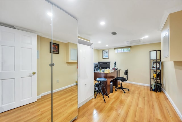 office space with wood finished floors, baseboards, ornamental molding, and recessed lighting