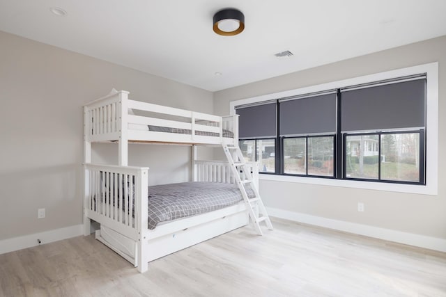 1350 Hortons Ln, Southold, NY 11971 - bedroom with wood finished floors and baseboards