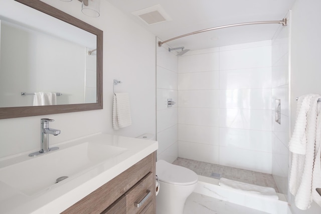 1350 Hortons Ln, Southold, NY 11971 - full bathroom with tiled shower, toilet, and vanity
