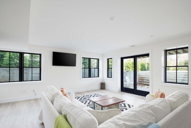 1350 Hortons Ln, Southold, NY 11971 - living area featuring baseboards and light wood-type flooring