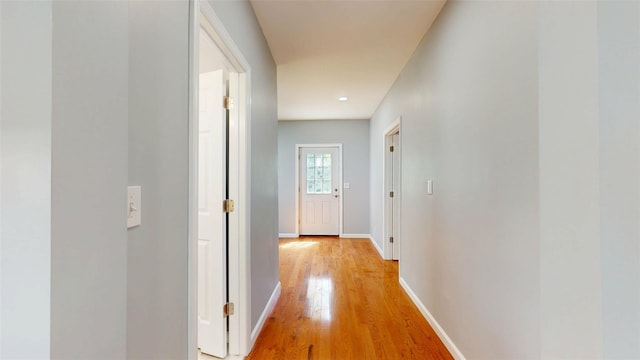 74 Gladstone Ave, Walden, NY 12586 - hallway featuring light wood-type flooring and baseboards
