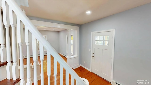 74 Gladstone Ave, Walden, NY 12586 - foyer entrance with light wood finished floors, stairway, recessed lighting, and baseboards