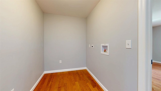 74 Gladstone Ave, Walden, NY 12586 - laundry room with electric dryer hookup, hookup for a washing machine, light wood finished floors, and baseboards