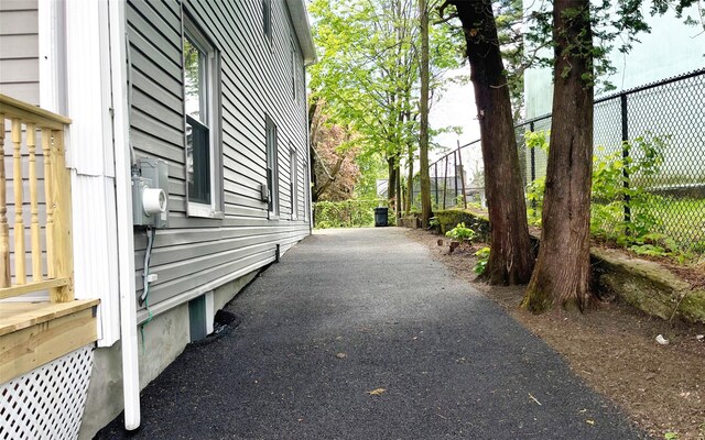 74 Gladstone Ave, Walden, NY 12586 - view of side of home featuring fence