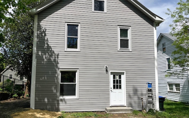 74 Gladstone Ave, Walden, NY 12586 - rear view of house featuring fence