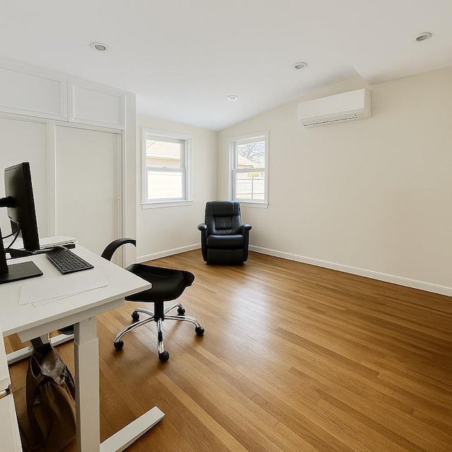 980 Siems Ct, North Bellmore, NY 11710 - office space featuring a wall unit AC, light wood finished floors, and baseboards