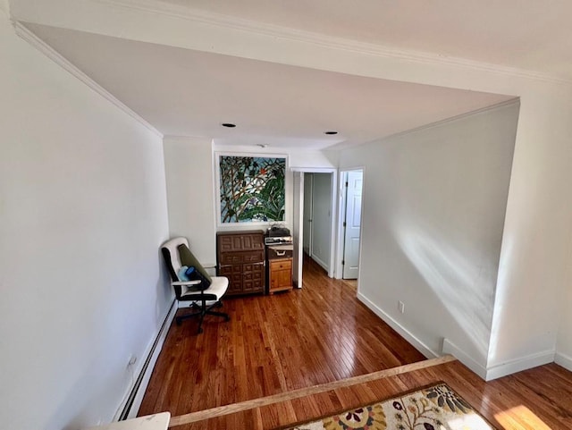 980 Siems Ct, North Bellmore, NY 11710 - sitting room featuring ornamental molding, wood finished floors, baseboards, and baseboard heating