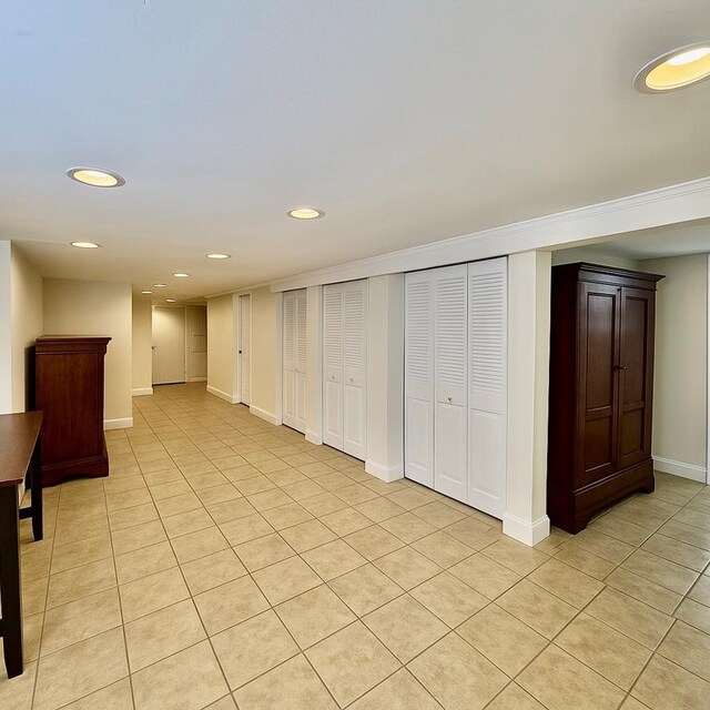 980 Siems Ct, North Bellmore, NY 11710 - basement with light tile patterned floors, recessed lighting, and baseboards